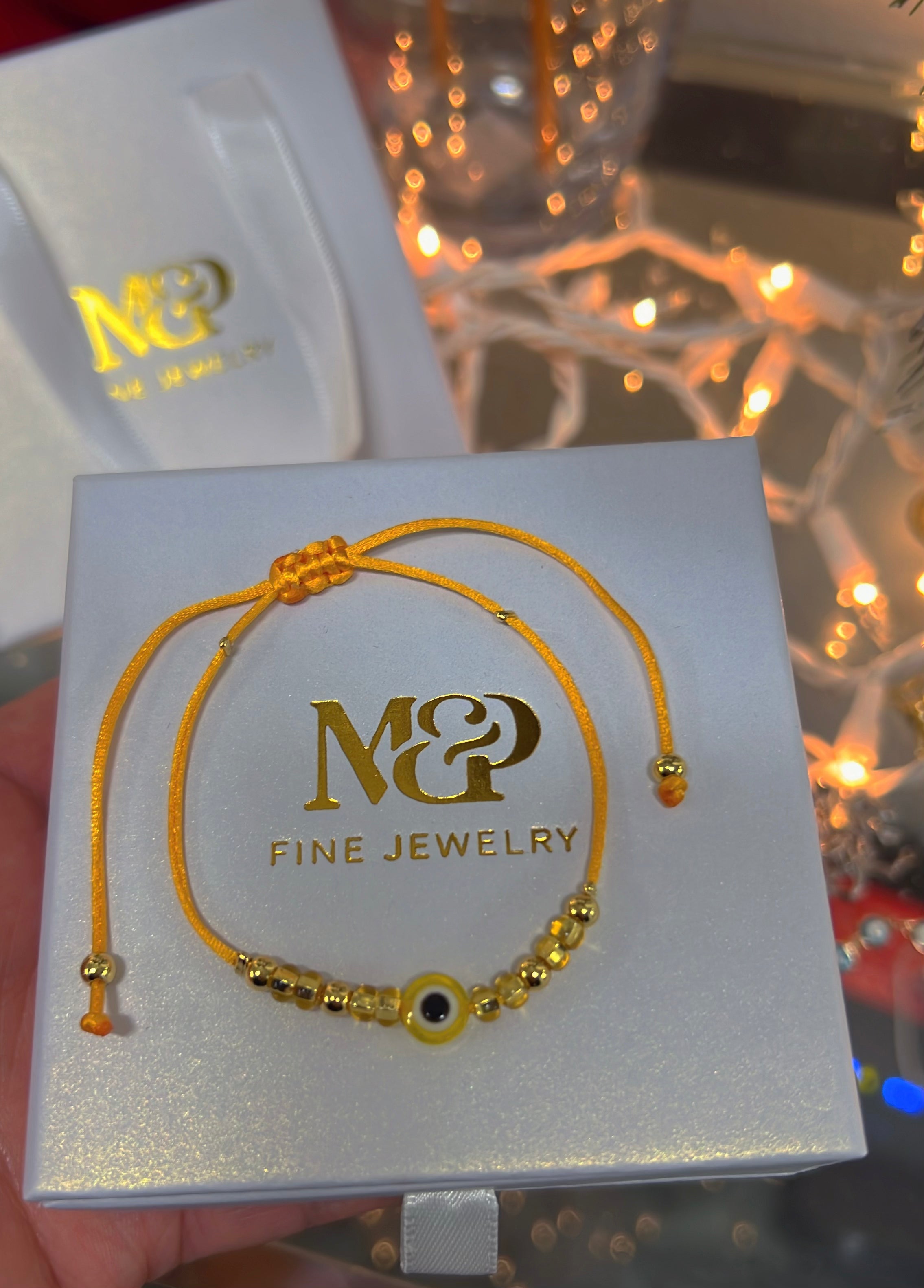 Pulsera de mal de ojo amarilla (1 pieza)