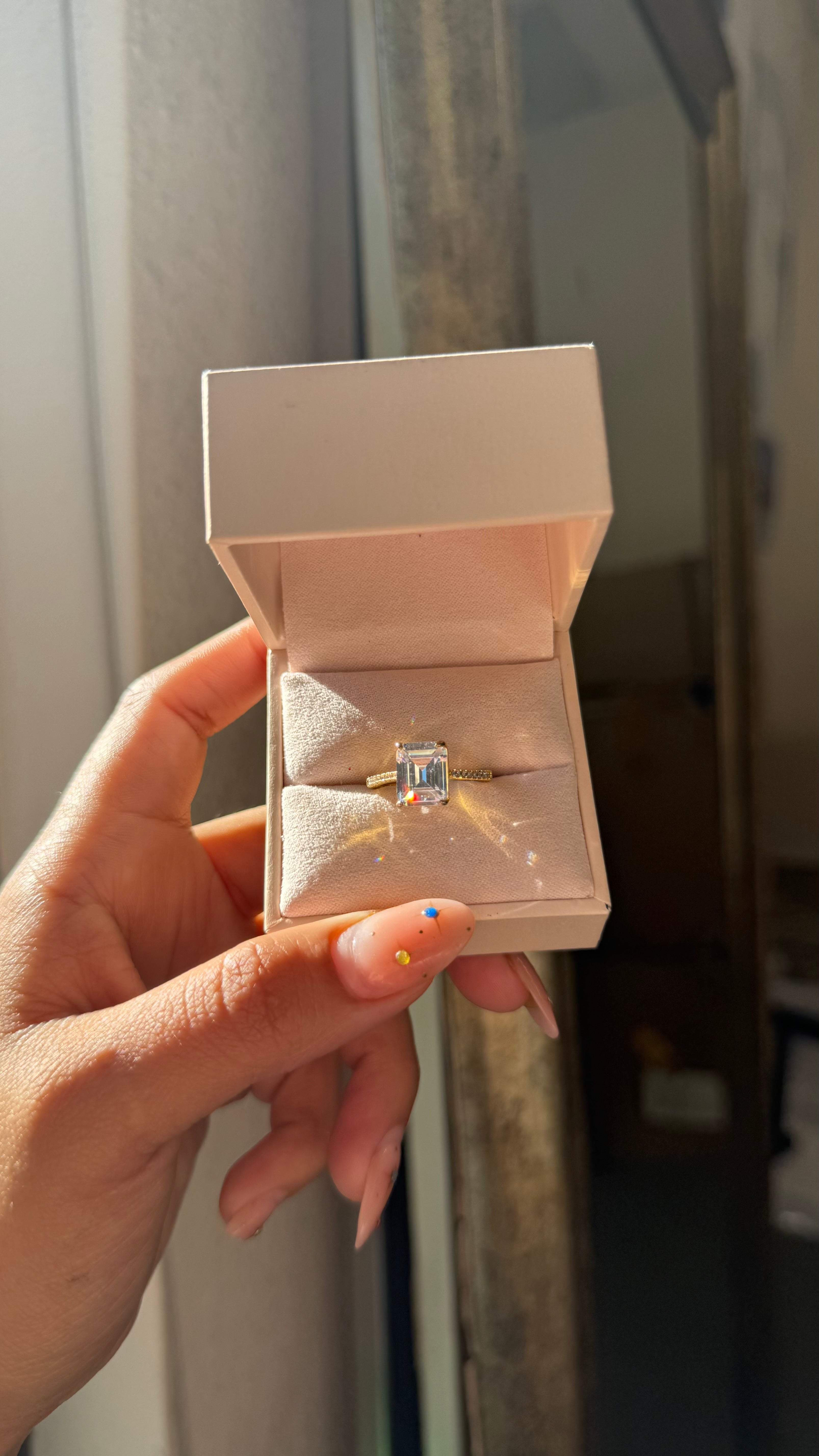 Solitaire Emerald Cut Ring